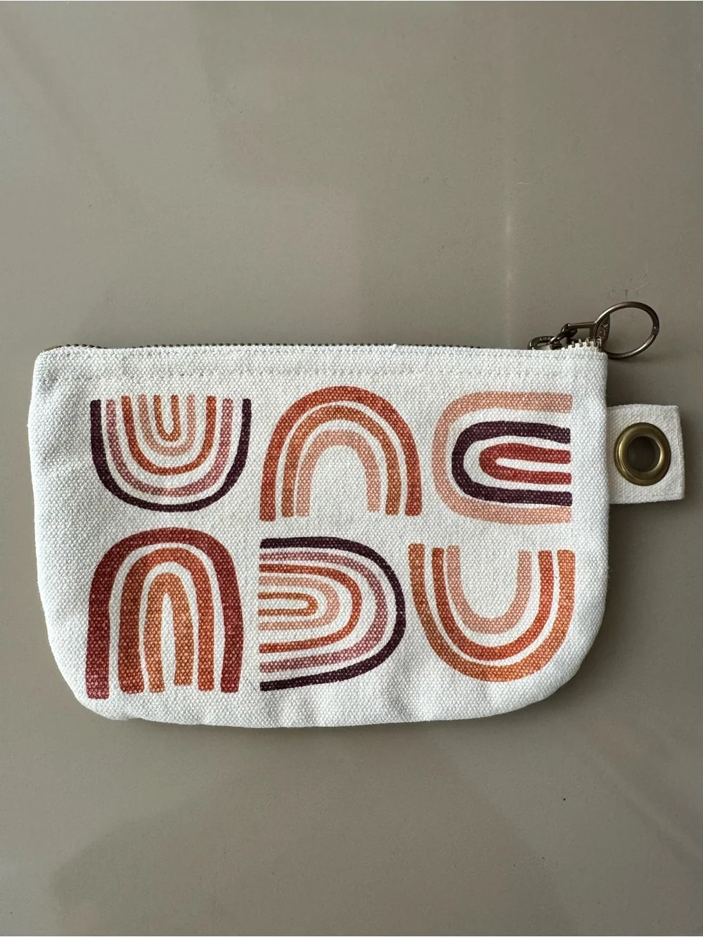 Danica Studio canvas zip pouch with terracotta rainbow screen-print design